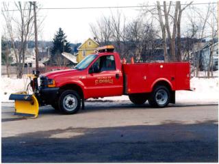 1999 Ford F450 Utility Truck with Fisher V plow. 